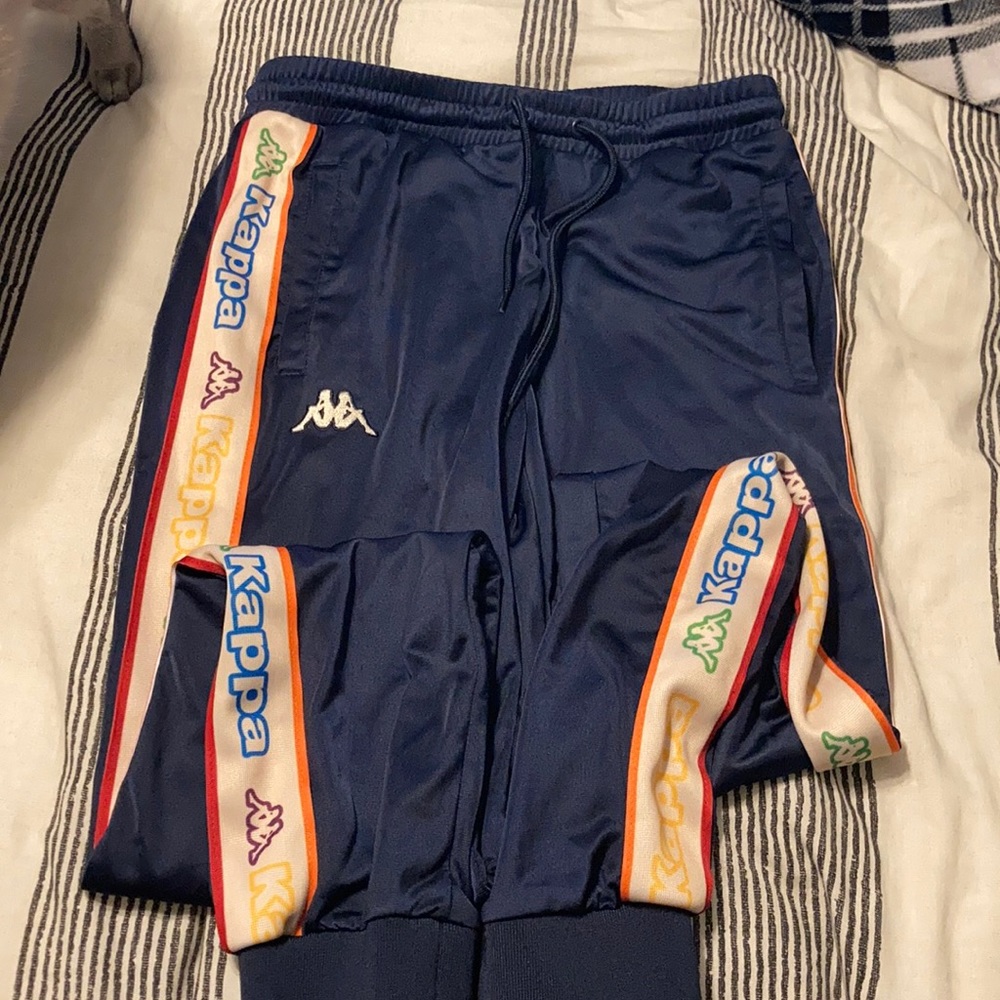 Kappa joggers with rainbow pattern along leg
